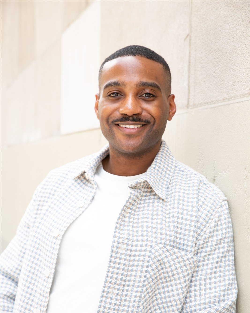 Jason L. Williams — Coach J Will, smiling